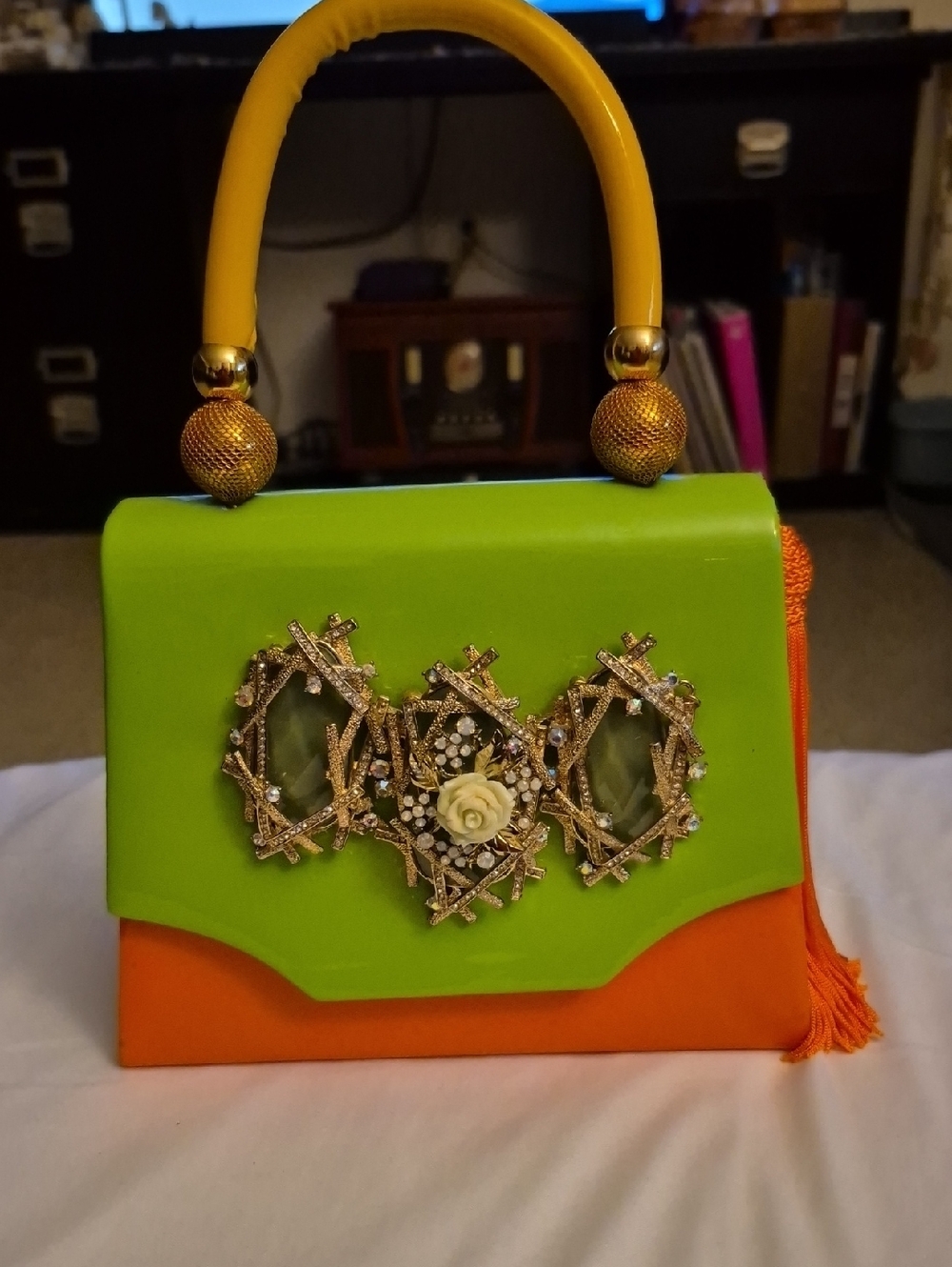 Bold Green & Orange Mini Top-Handle Bag with Decorative Tassel & Crossbody Strap
